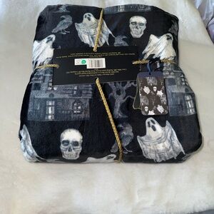 Rachel Roy ghosts,crows, haunted house
Skulls Throw